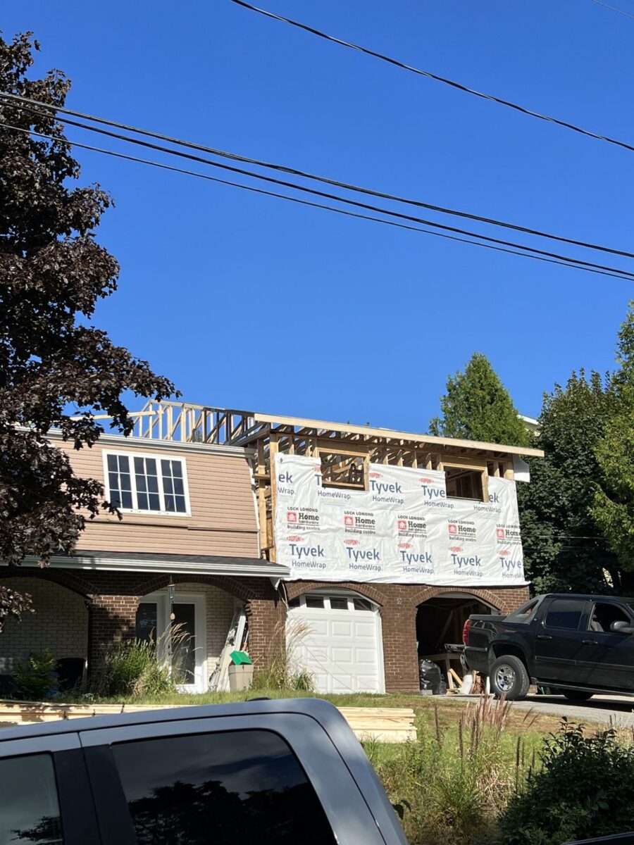 Second storey framed and wrapped above the garage