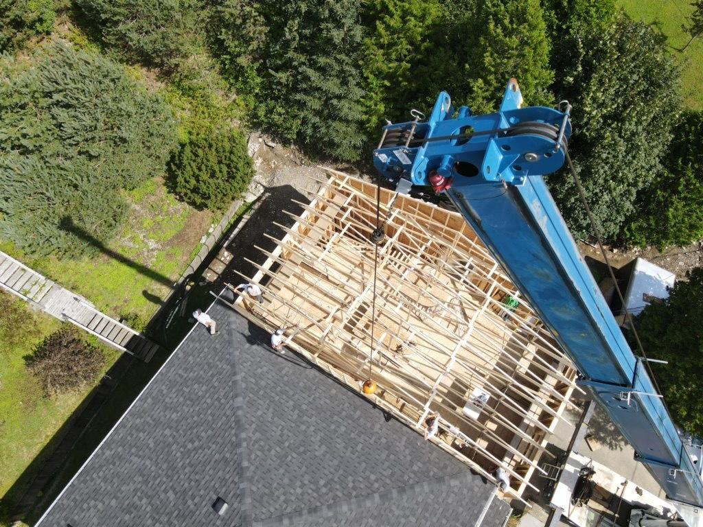 Roof trusses lifted into place