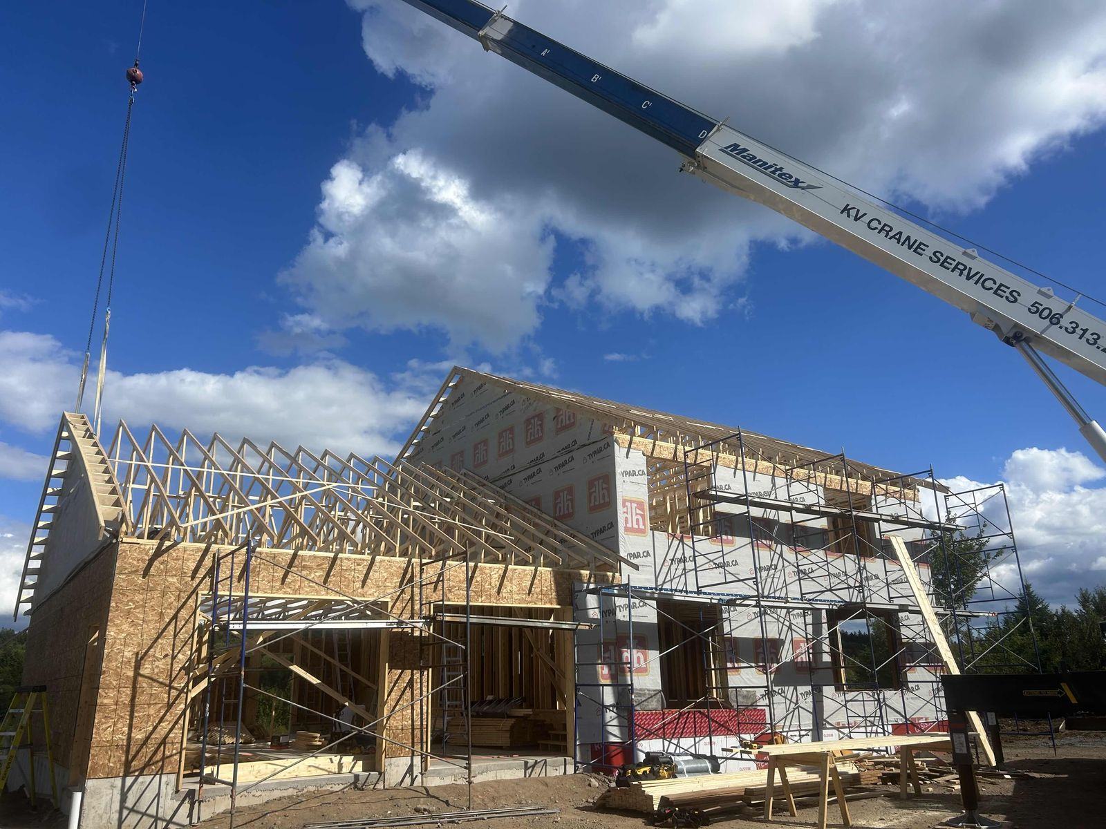Roof trusses set by crane