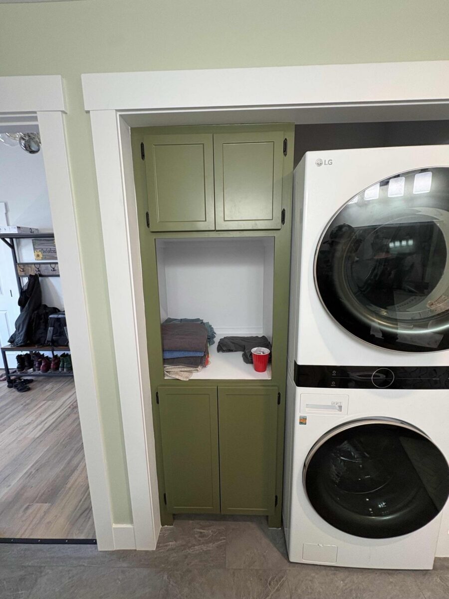Custom laundry with built-in cabinetry