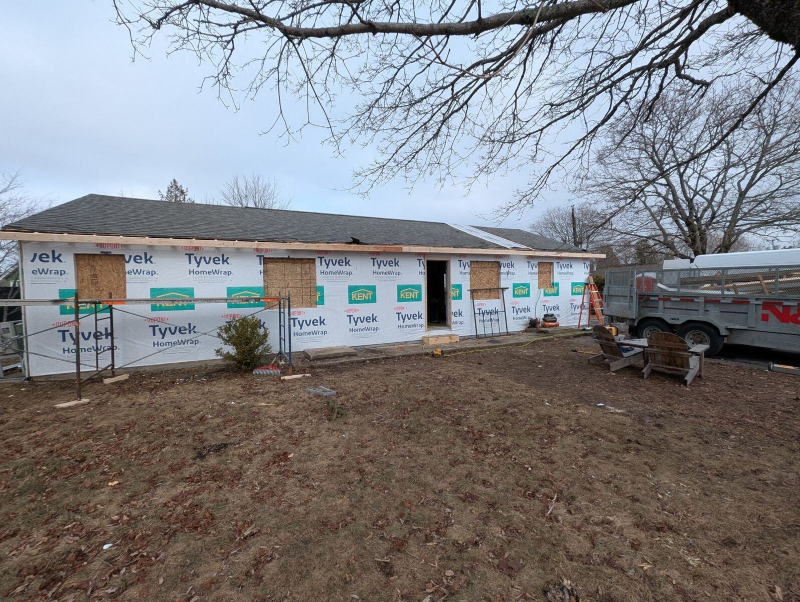 The house wrapped during the overhaul