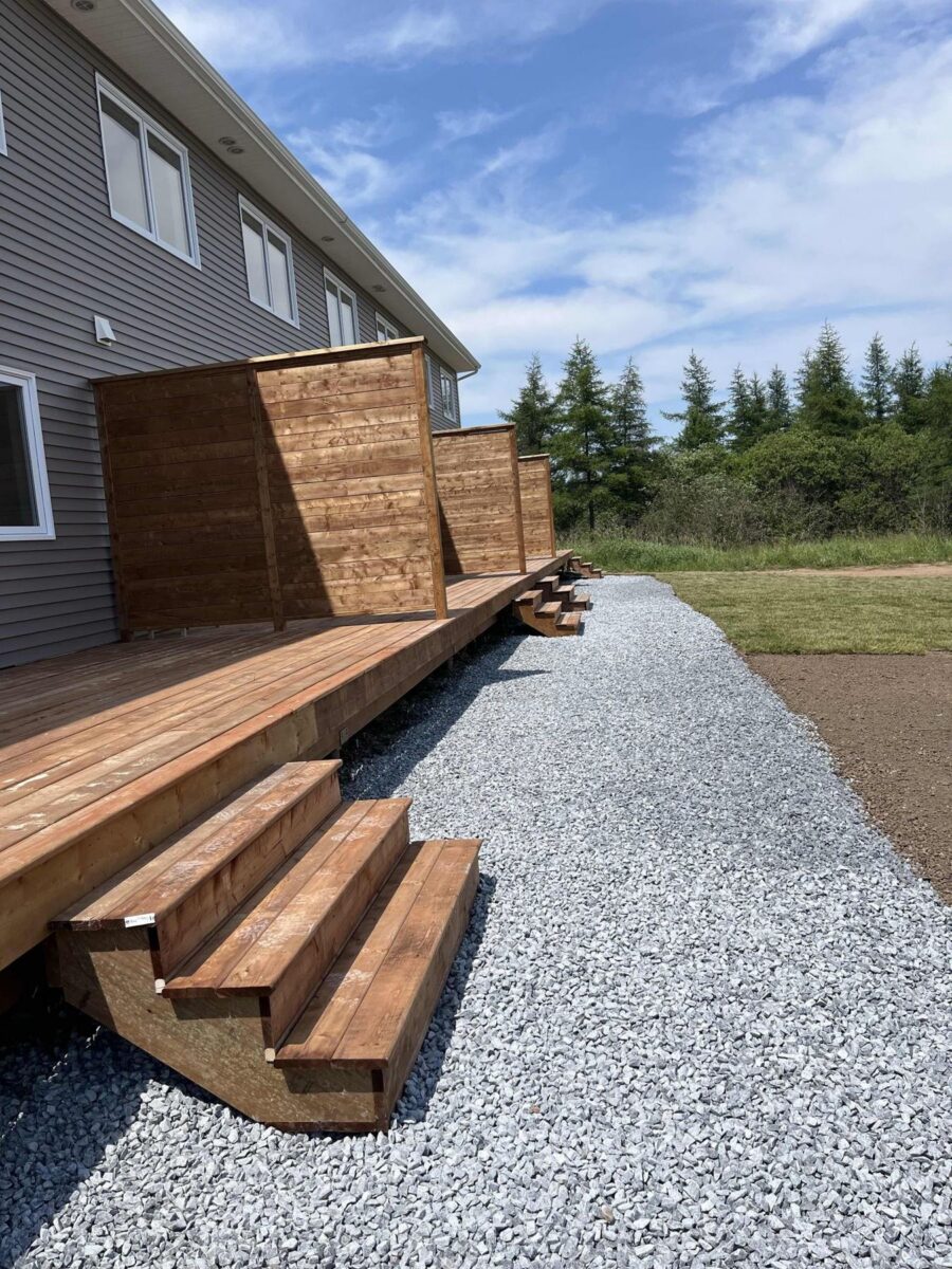 Cedar decks and privacy screens at the back