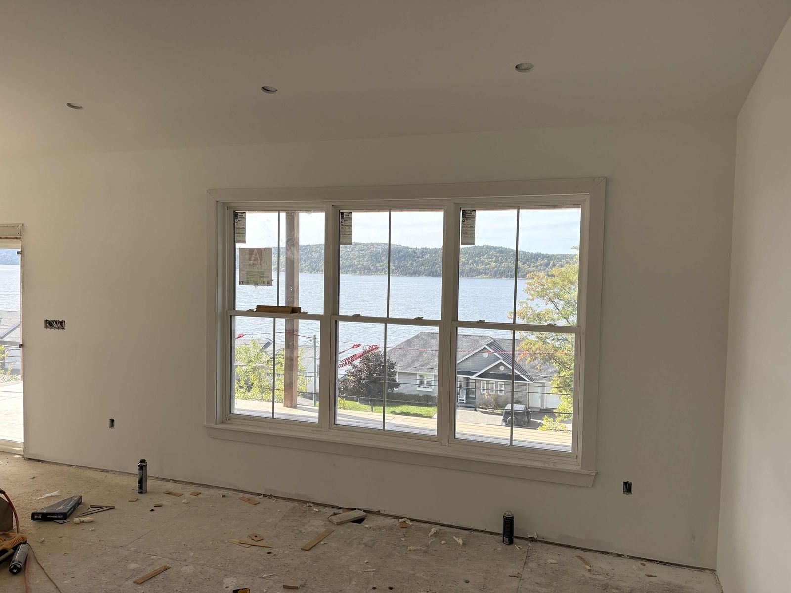 Triple-pane windows looking out to the river