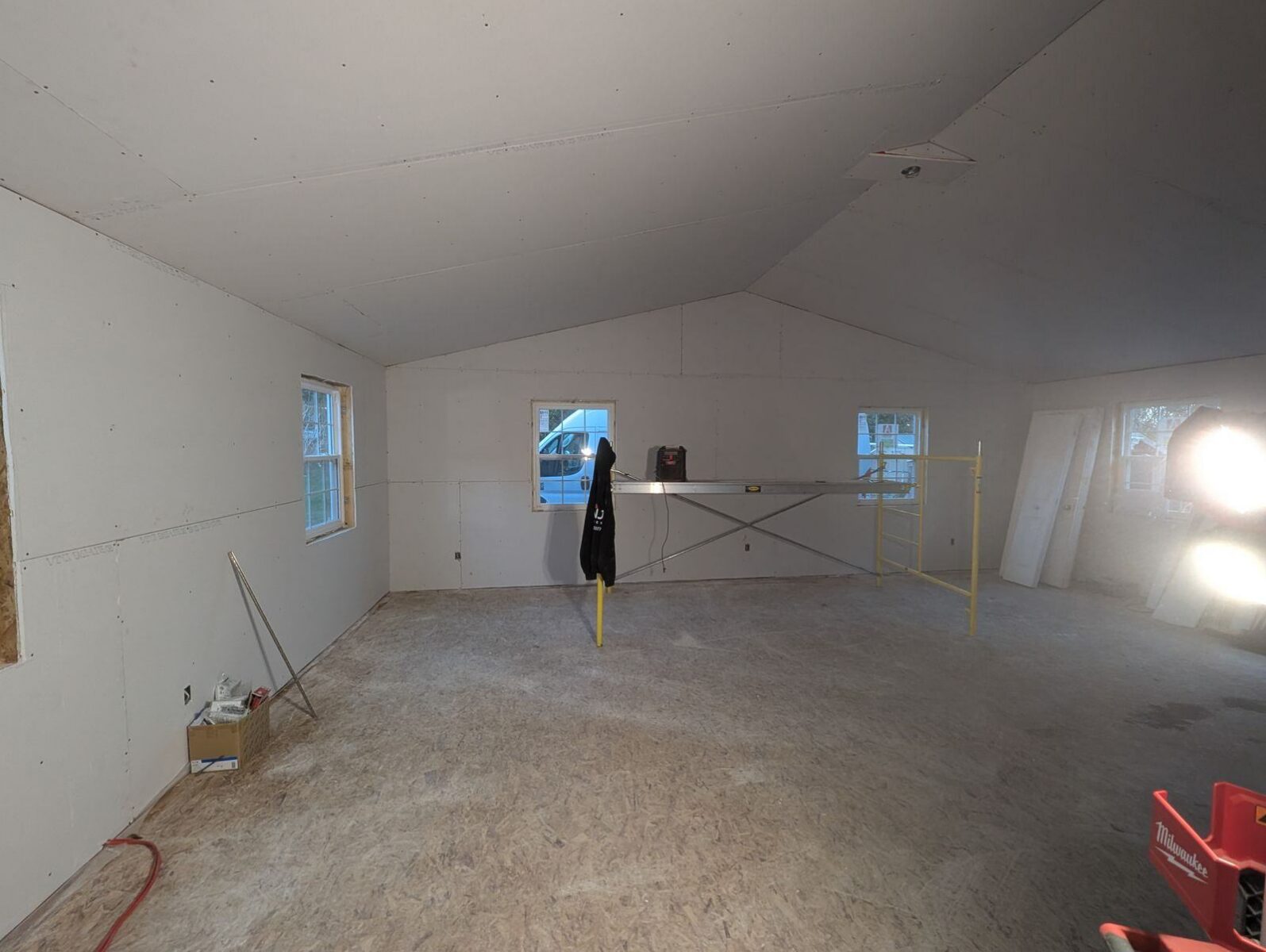 Finished addition interior with vaulted ceiling